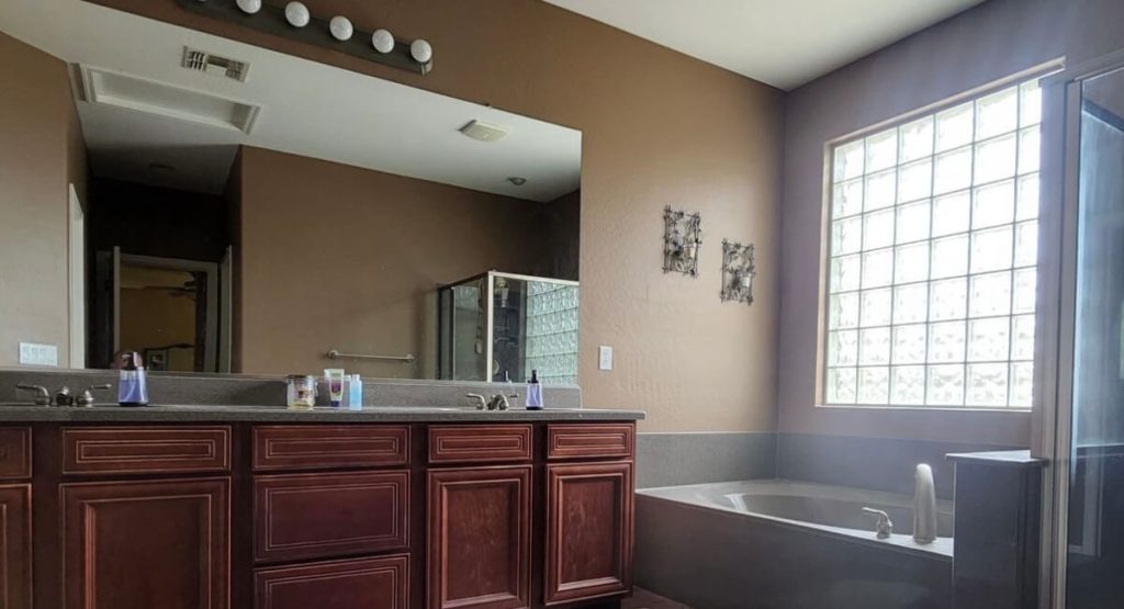 Brown Bath to Elegant Retreat — before